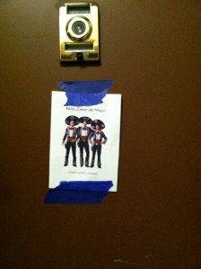 the cinco sign on the neighbors' door